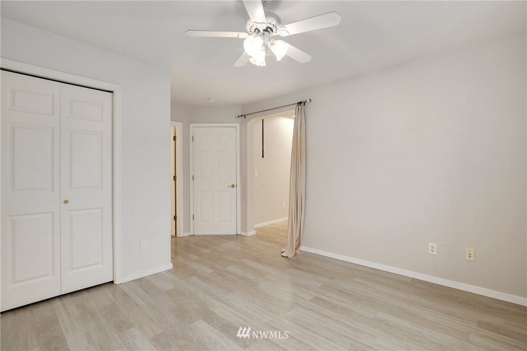 17539 110 Lane Southeast, Unit 20 Renton, WA 98055 - Photo 12 of 25 wooden floor in an empty room