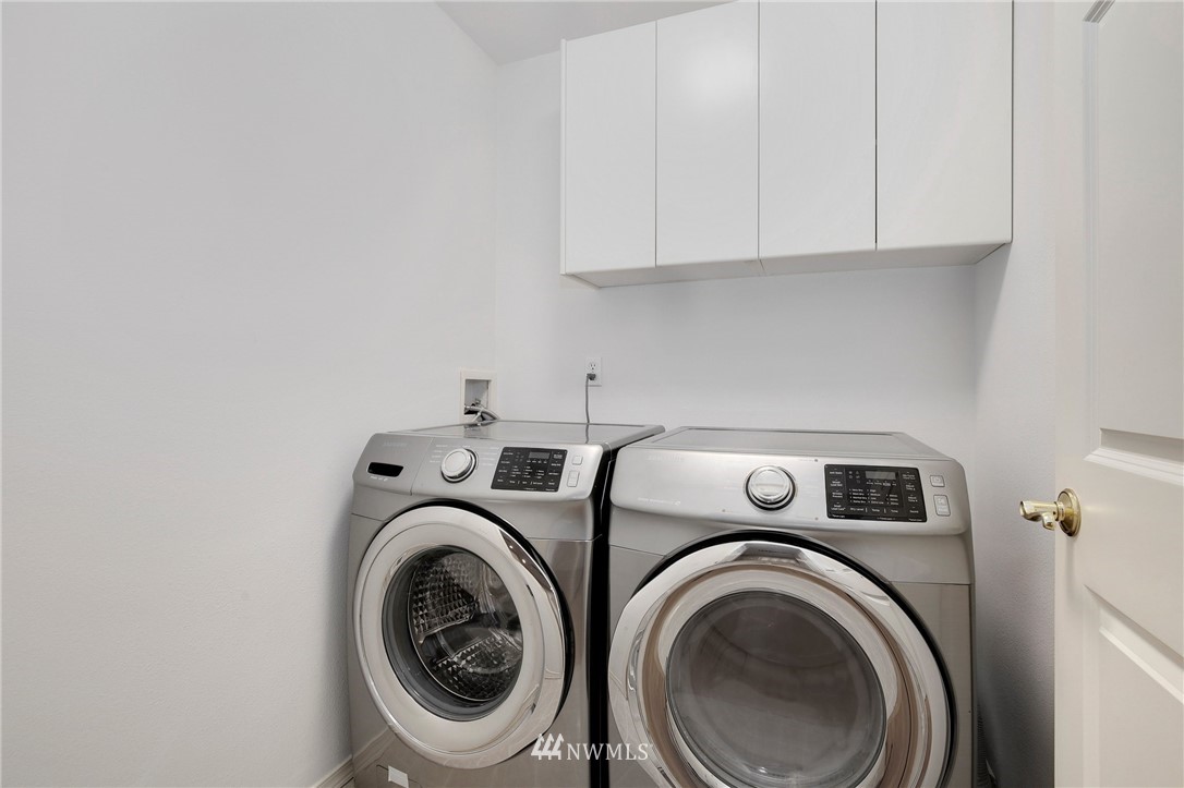 17539 110 Lane Southeast, Unit 20 Renton, WA 98055 - Photo 19 of 25 a utility room with dryer and washer