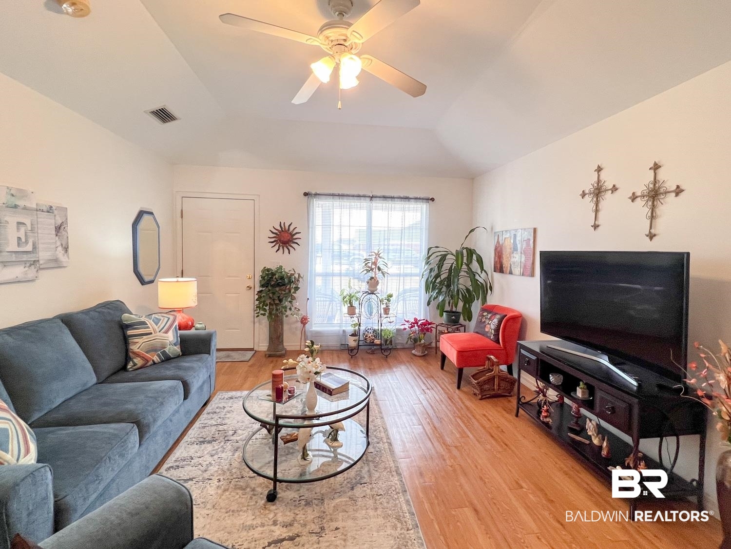 16690 Plum Court Loxley, AL 36551 - Photo 6 of 30 Living room featuring vaulted ceiling, ceiling fan, and light hardwood / wood-style floors