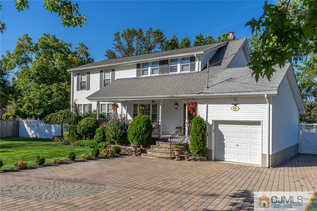 101 Aberdeen Road Aberdeen, NJ 07747 - Photo 3 of 21 a front view of a house with garden