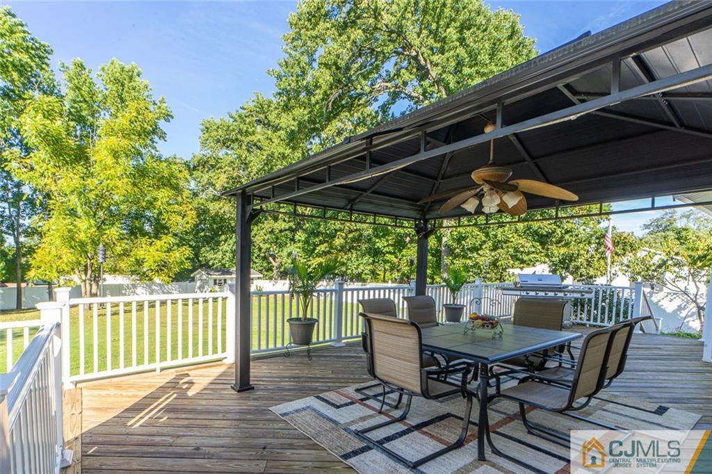 101 Aberdeen Road Aberdeen, NJ 07747 - Photo 5 of 21 a view of a chairs and table in the deck