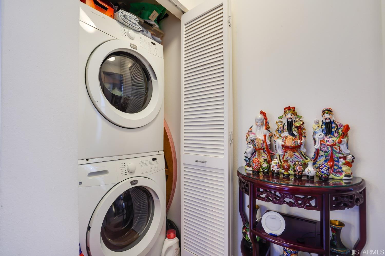 888 7th Street, Unit 120 San Francisco, CA 94107 - Photo 6 of 20 a view of a storage room with washer and dryer