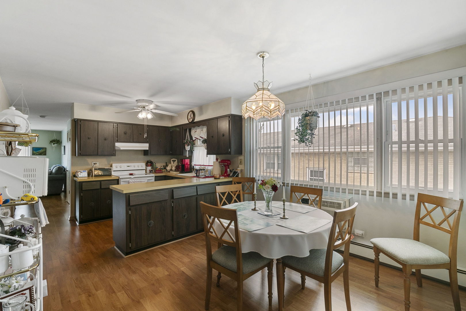 3108 Harlem Avenue Riverside, IL 60546 - Photo 11 of 25 a view of a dining room with furniture window and wooden floor