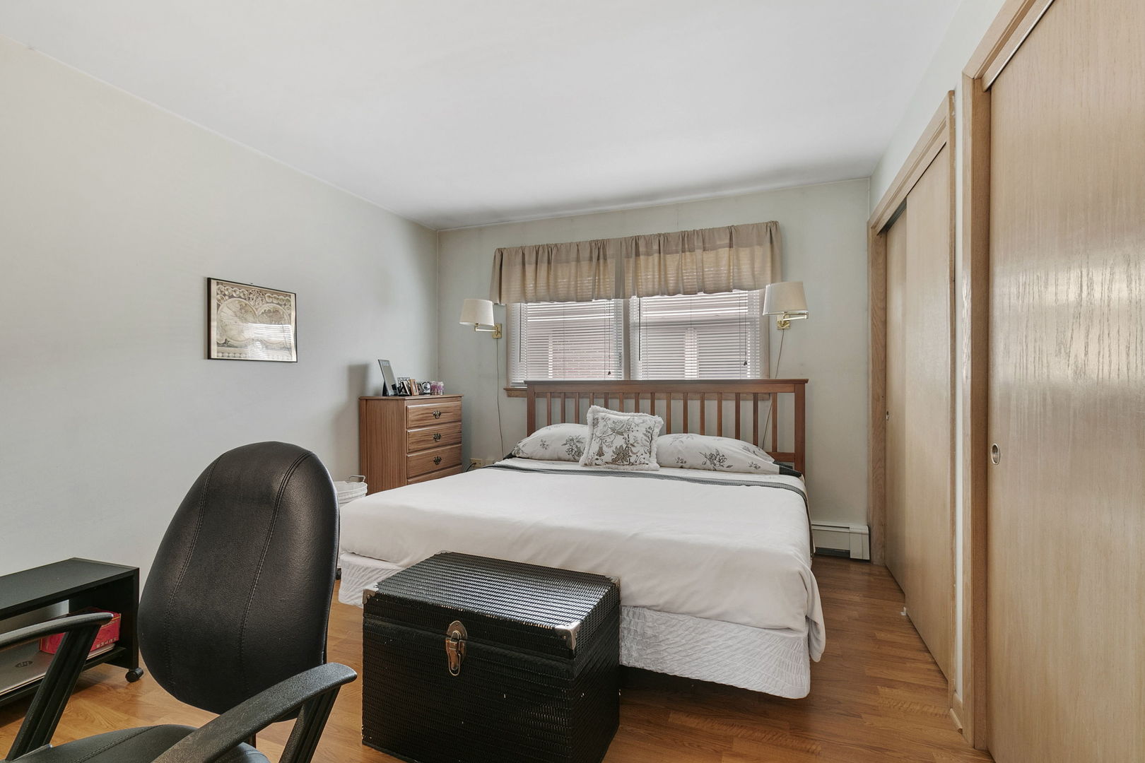 3108 Harlem Avenue Riverside, IL 60546 - Photo 8 of 25 a bedroom with a bed and a chair