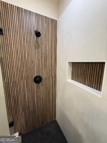 a view of a staircase with wooden floor