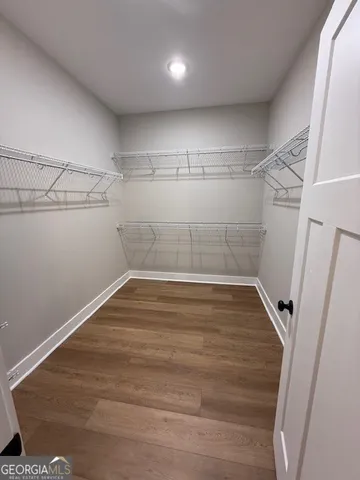 a view of a room with racks on the wall