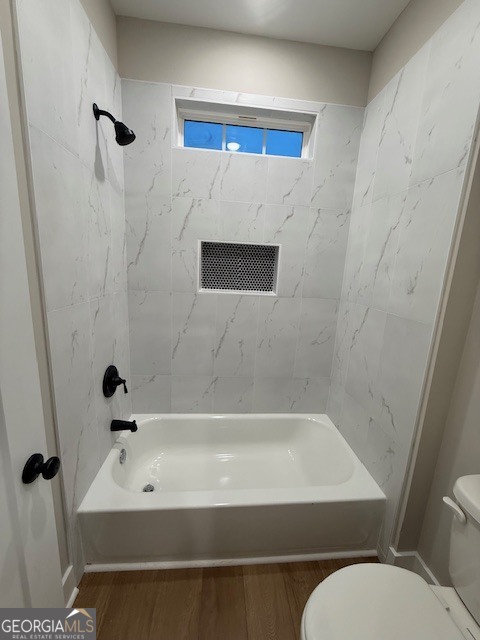 603 Silver Dollar Road Barnesville, GA 30204 - Photo 27 of 33 a bathroom with a bathtub and a shower