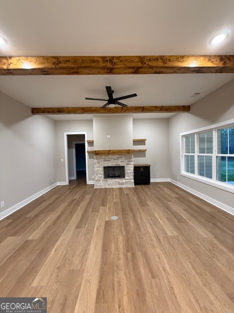 603 Silver Dollar Road Barnesville, GA 30204 - Photo 3 of 33 a view of empty room with wooden floor and fan