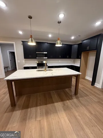 a lobby with furniture and a table