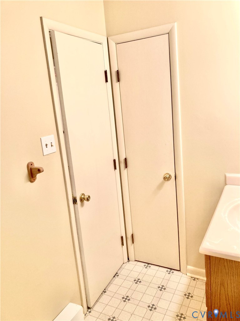 437 Queensway Road Chesterfield, VA 23236 - Photo 32 of 58 Front Shared Bathroom Linen Closet