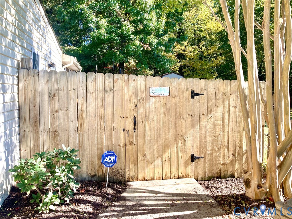 437 Queensway Road Chesterfield, VA 23236 - Photo 57 of 58 Right Gated Entrance to Rear Yard