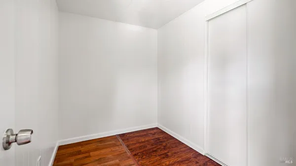 a view of small space with racks on the wall