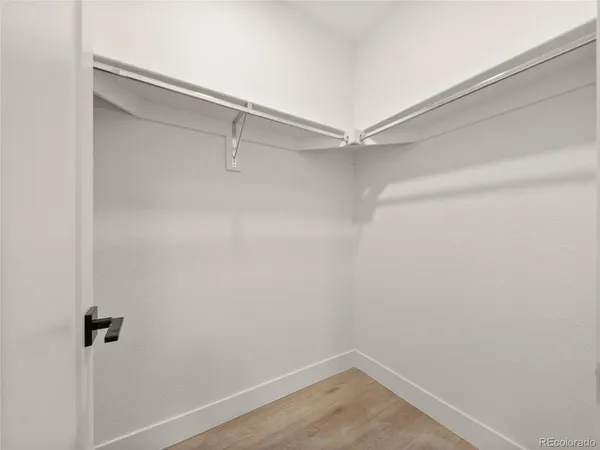 a view of a room with racks on the wall