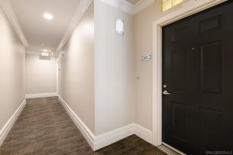 a view of a brick buildings with many windows