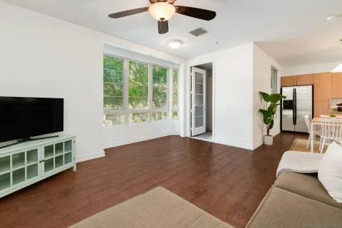 a view of livingroom with furniture wooden floor and window