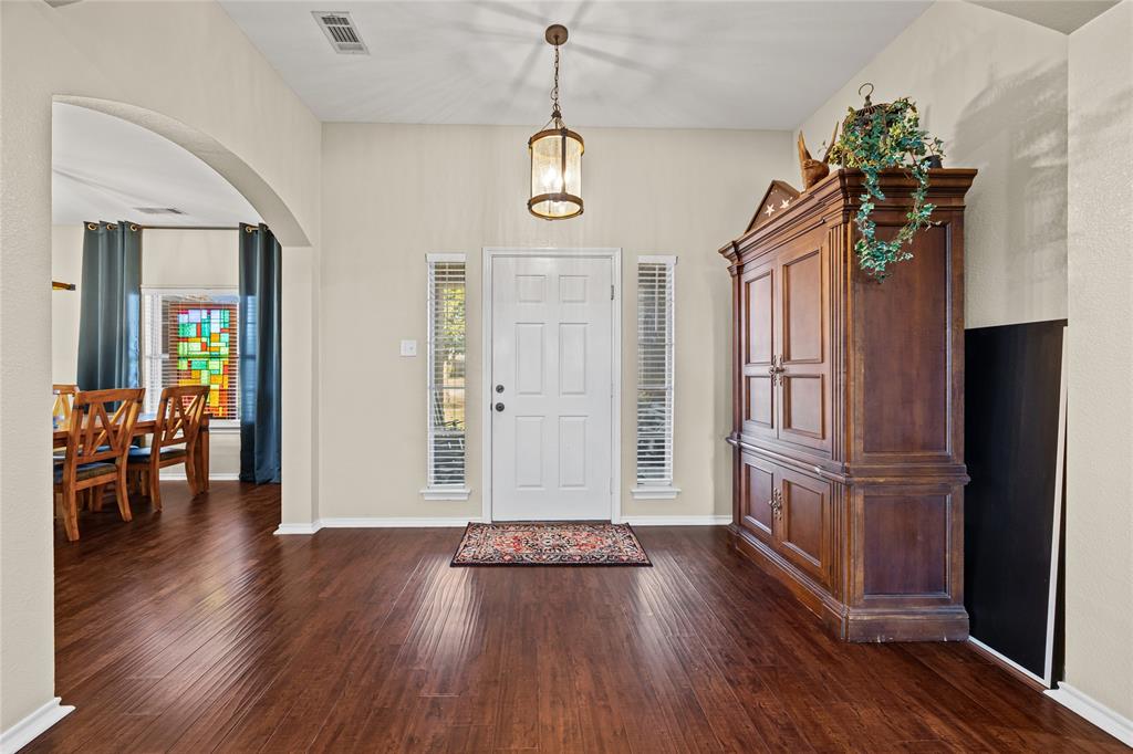 112 Springfield Lane Red Oak, TX 75165 - Photo 5 of 40 a view of an entryway with wooden floor
