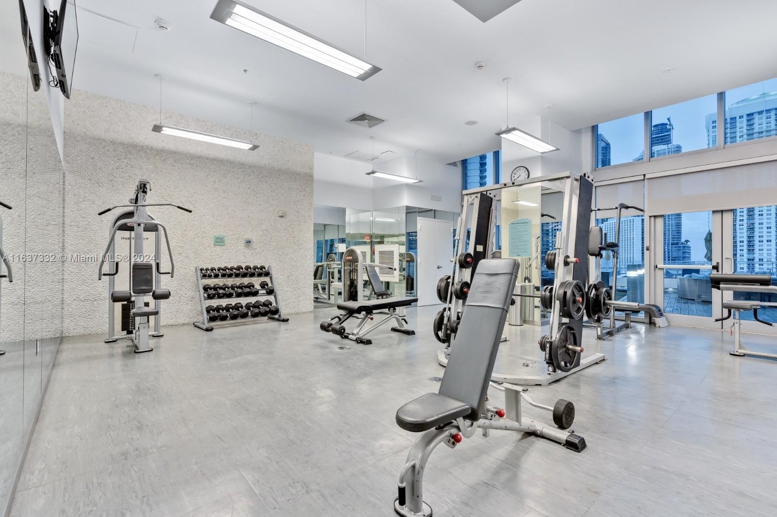 92 Southwest 3rd Street, Unit 1505 Miami, FL 33130 - Photo 34 of 37 a view of a room with gym equipment
