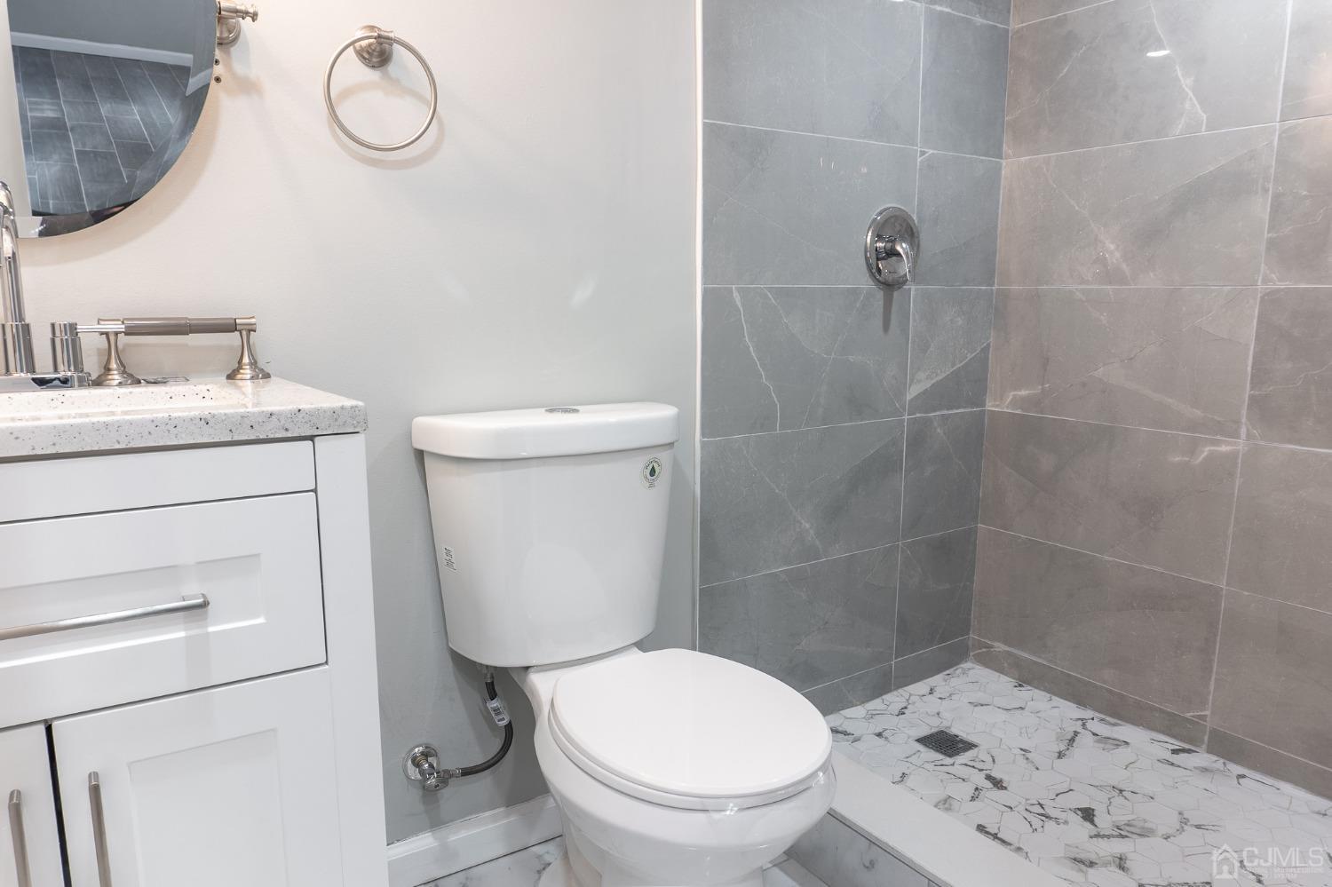420 Crows Mill Road Fords, NJ 08863 - Photo 18 of 38 a bathroom with a toilet and a shower