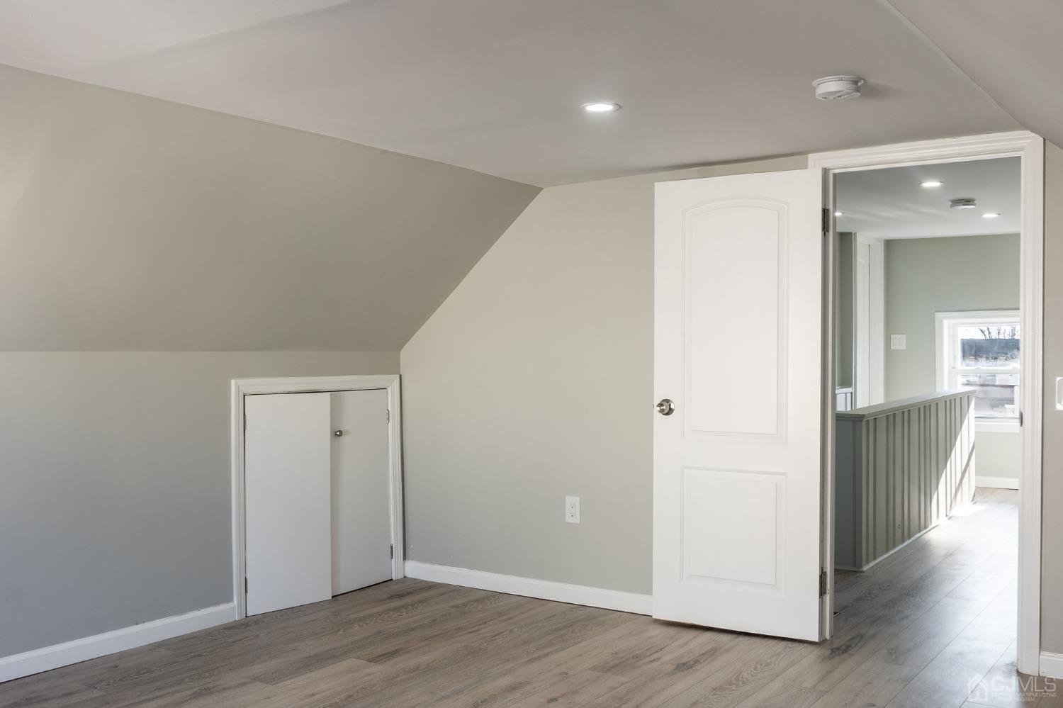 420 Crows Mill Road Fords, NJ 08863 - Photo 23 of 38 a view of a hallway with wooden floor