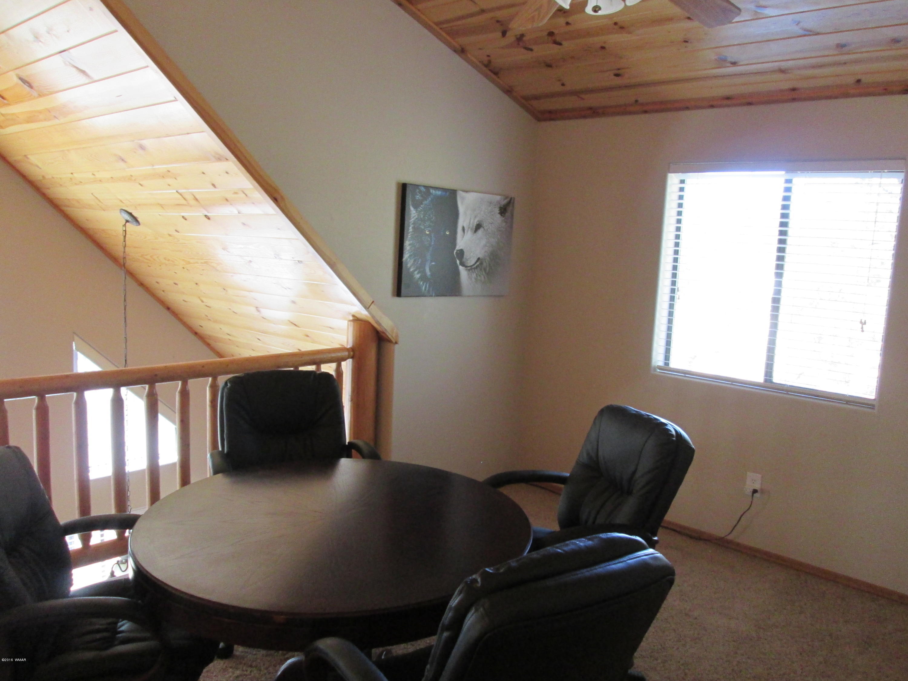 3048 Aspen Road Overgaard, AZ 85933 - Photo 20 of 36 a living room with furniture