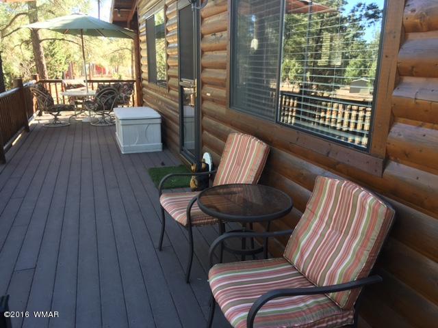 3048 Aspen Road Overgaard, AZ 85933 - Photo 10 of 36 a view of a outdoor seating area with furniture