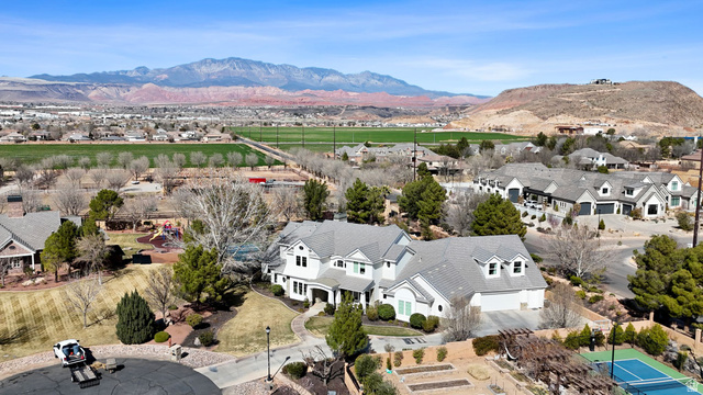 2917 Old Farm Road Washington, UT 84780 - Photo 2 of 105 Aerial view of residential area with a mountainous background