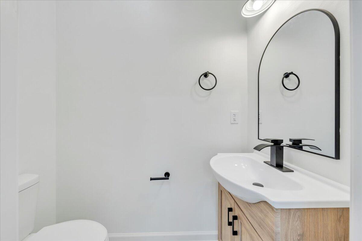 610 Gap Bridge Road Moneta, VA 24121 - Photo 11 of 62 a bathroom with a sink and mirror
