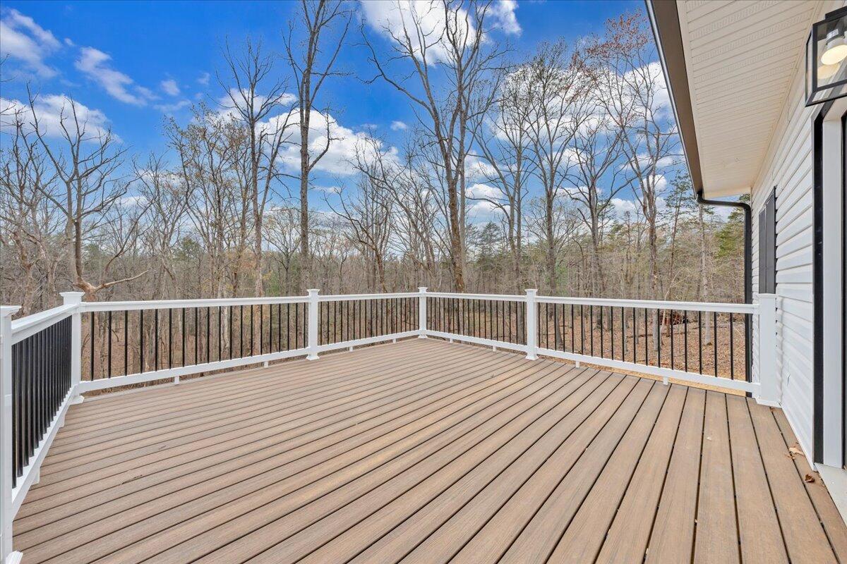 610 Gap Bridge Road Moneta, VA 24121 - Photo 25 of 62 a view of backyard with deck and wooden floor