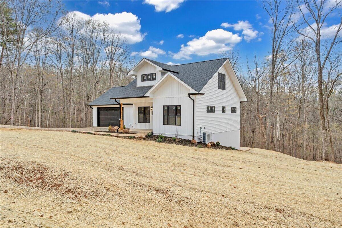 610 Gap Bridge Road Moneta, VA 24121 - Photo 34 of 62 a view of a house with a snow in the yard