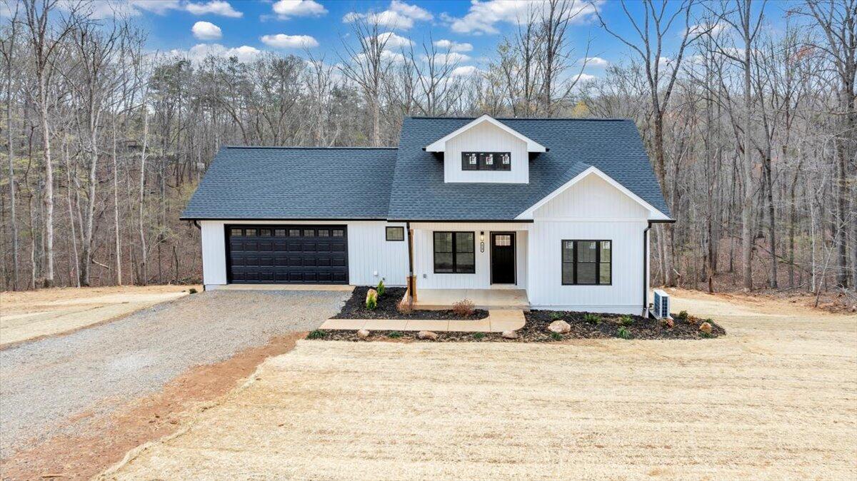 610 Gap Bridge Road Moneta, VA 24121 - Photo 37 of 62 a front view of a house with a yard