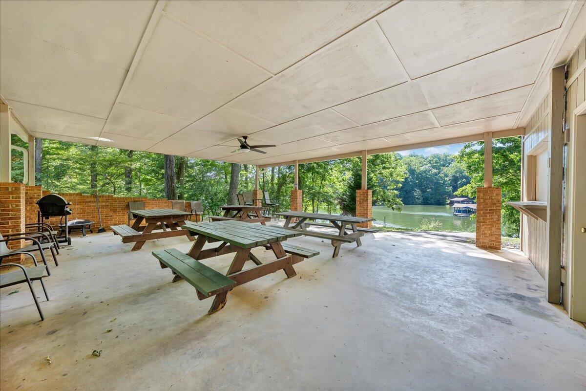 610 Gap Bridge Road Moneta, VA 24121 - Photo 59 of 62 a living room with patio furniture and a garden