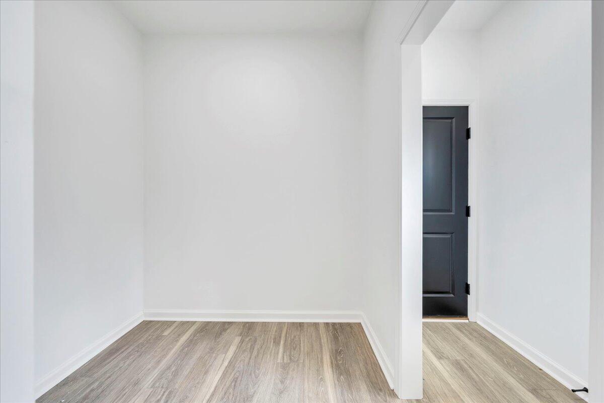 610 Gap Bridge Road Moneta, VA 24121 - Photo 10 of 62 a view of a room with wooden floor and a window
