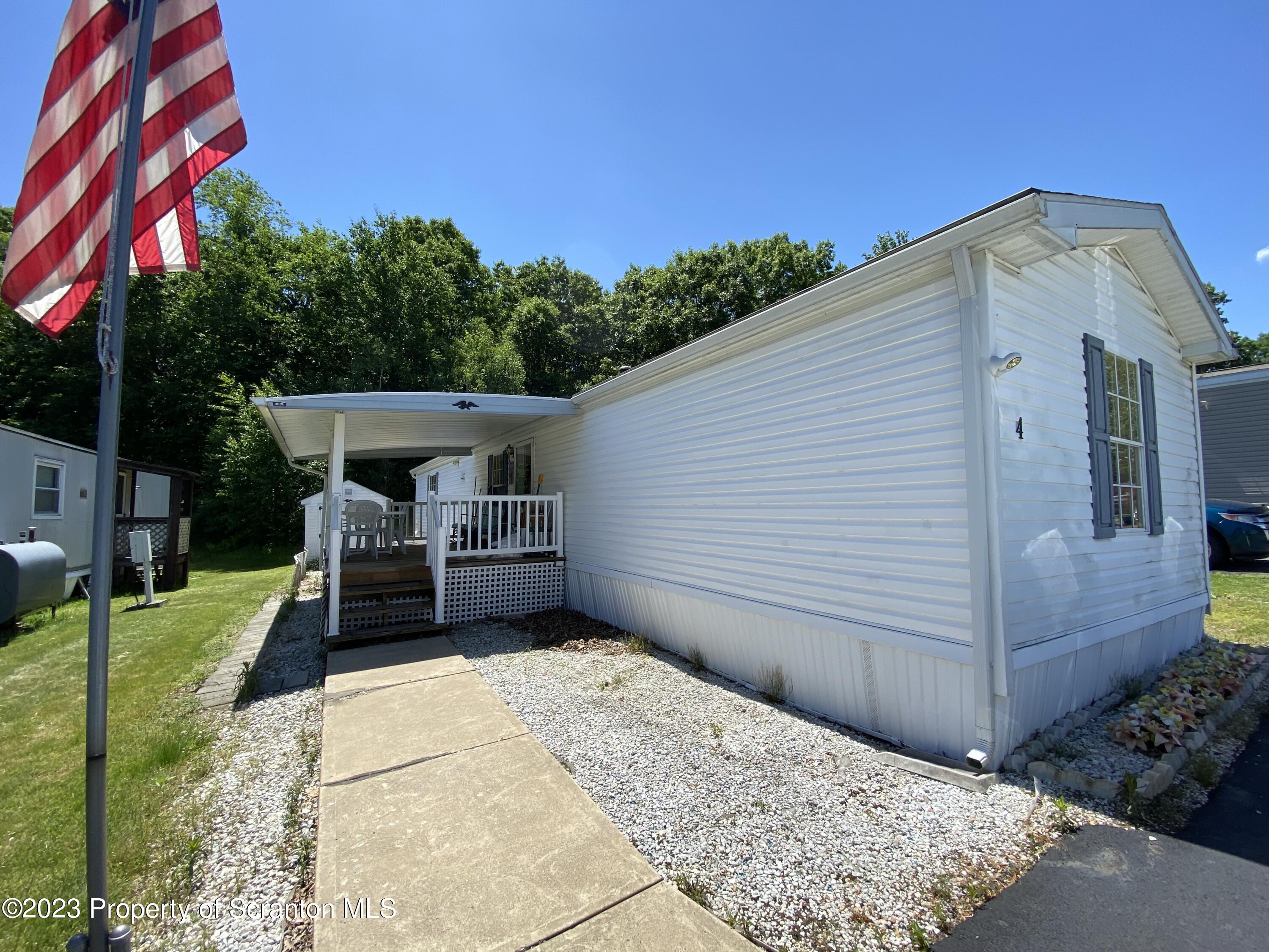 a house view with a backyard space