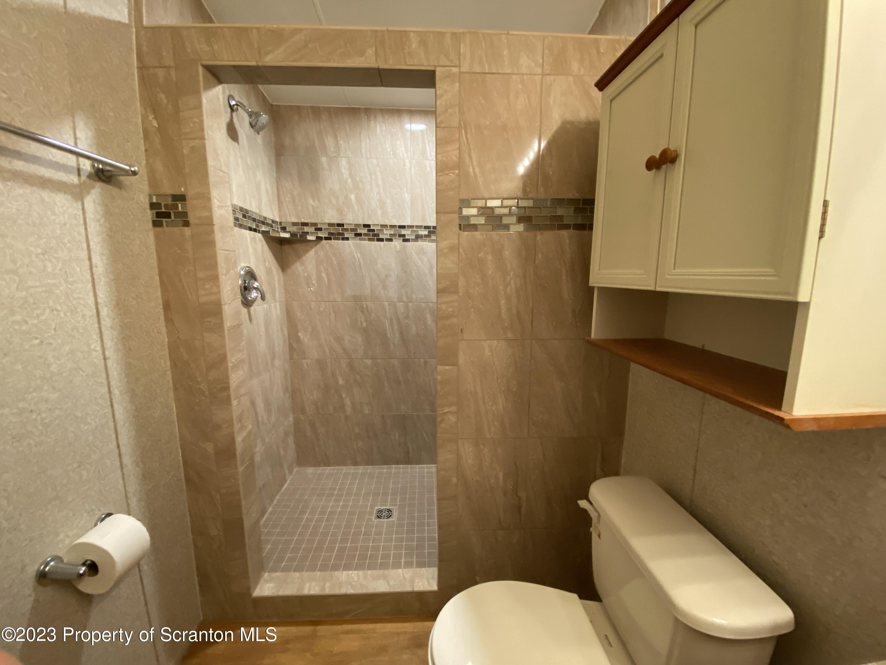 4 Honor Park Moosic, PA 18507 - Photo 15 of 24 a bathroom with a toilet and a shower