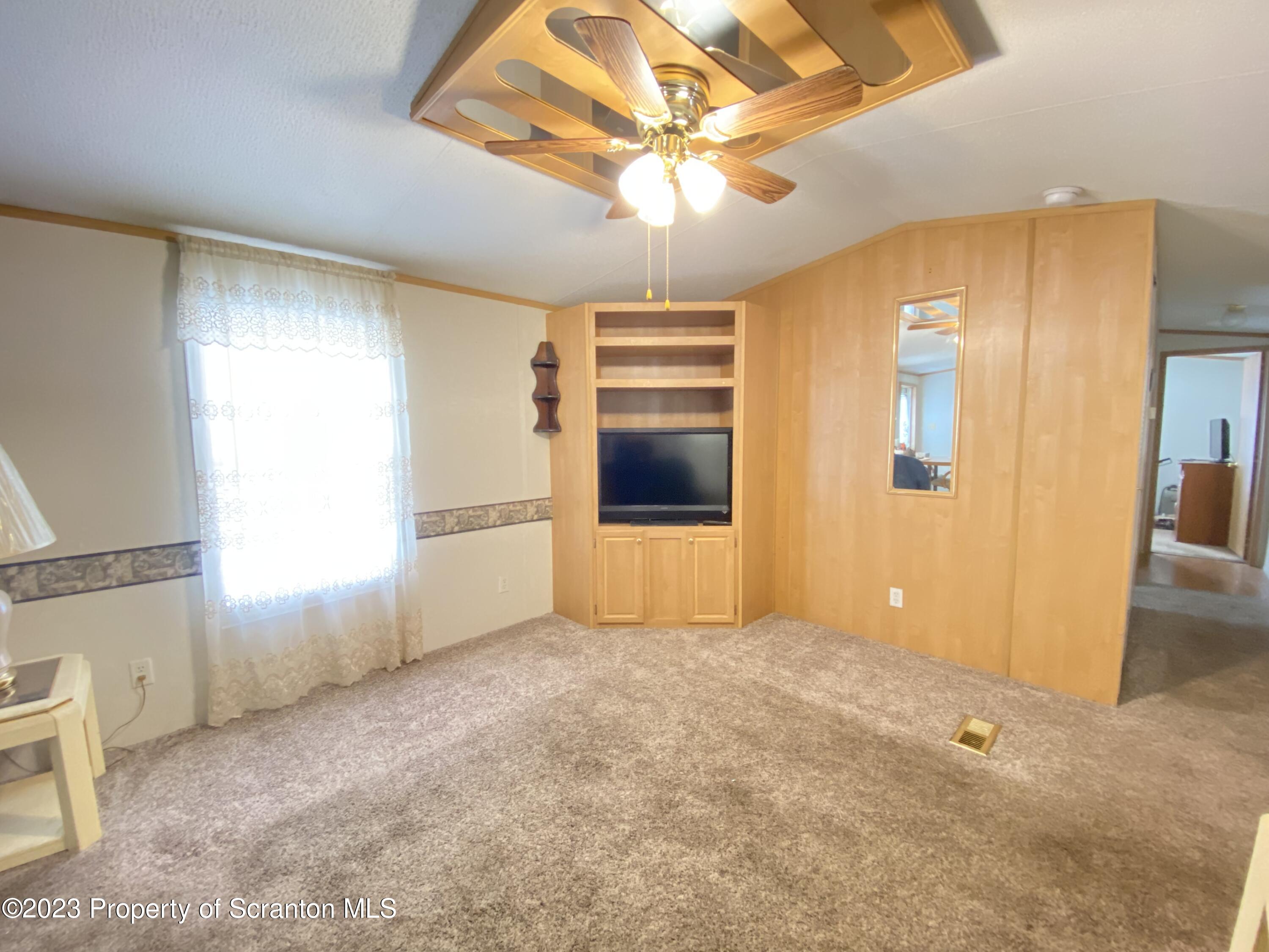 4 Honor Park Moosic, PA 18507 - Photo 8 of 24 a view of an empty room with a window