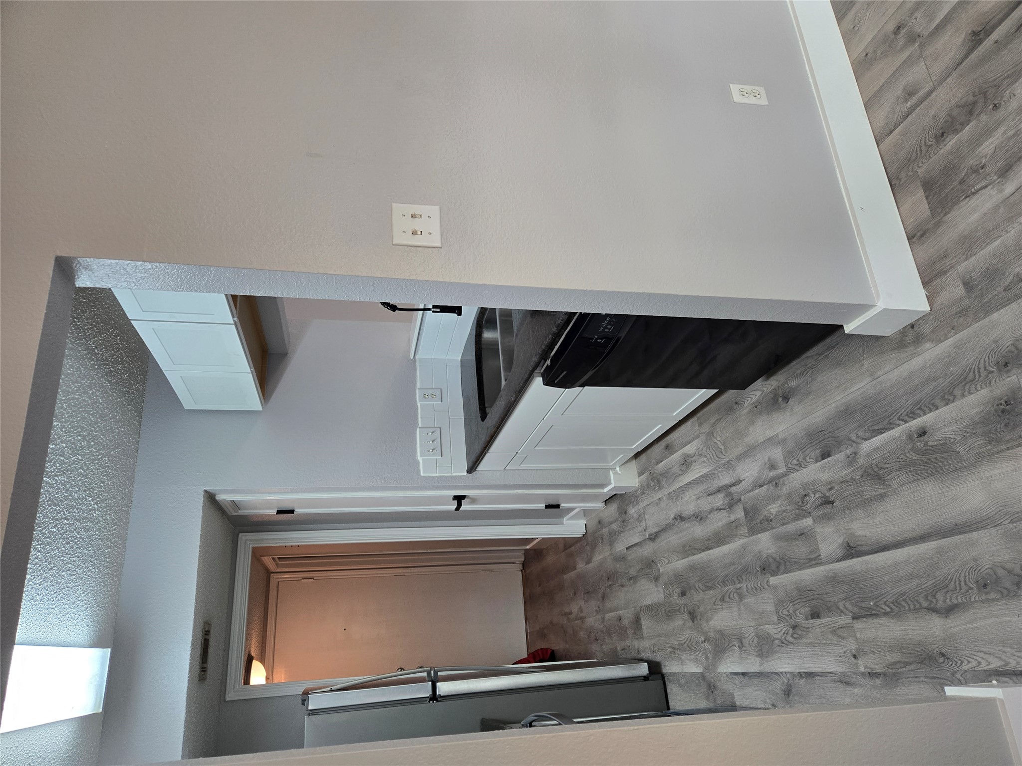 10001 Parliament House Road, Unit A Austin, TX 78729 - Photo 2 of 25 a kitchen with granite countertop a stove and a sink