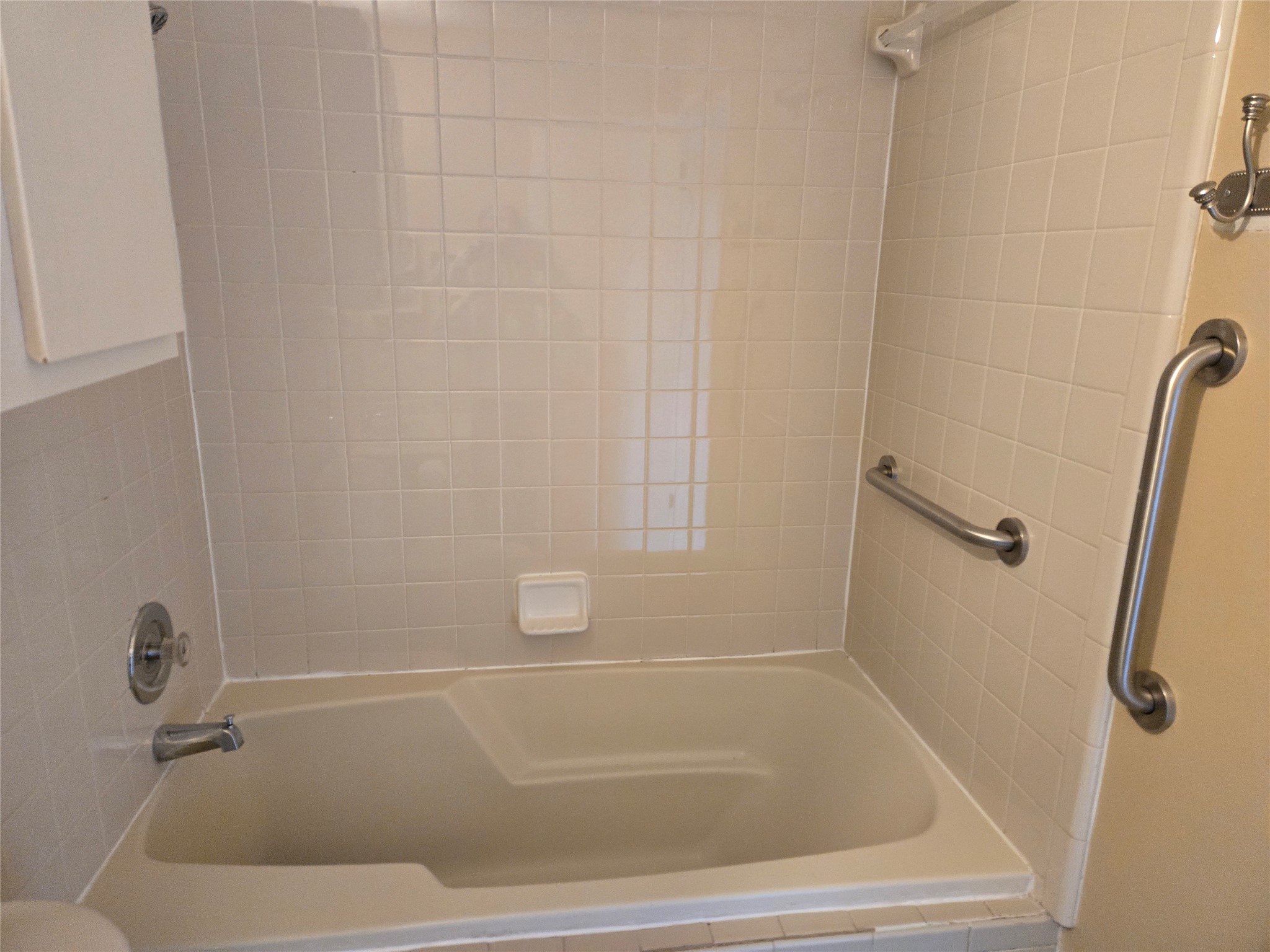 10001 Parliament House Road, Unit A Austin, TX 78729 - Photo 23 of 25 a bathroom with a shower