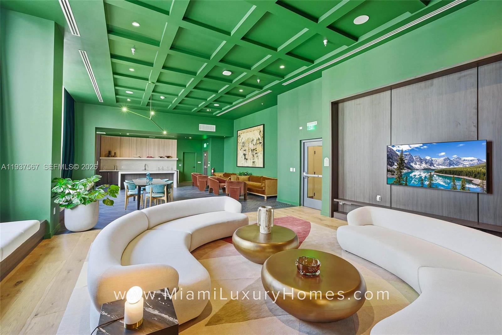 11 Northeast 6th Street, Unit 709 Miami, FL 33132 - Photo 31 of 54 a living room with furniture a chandelier and a fireplace