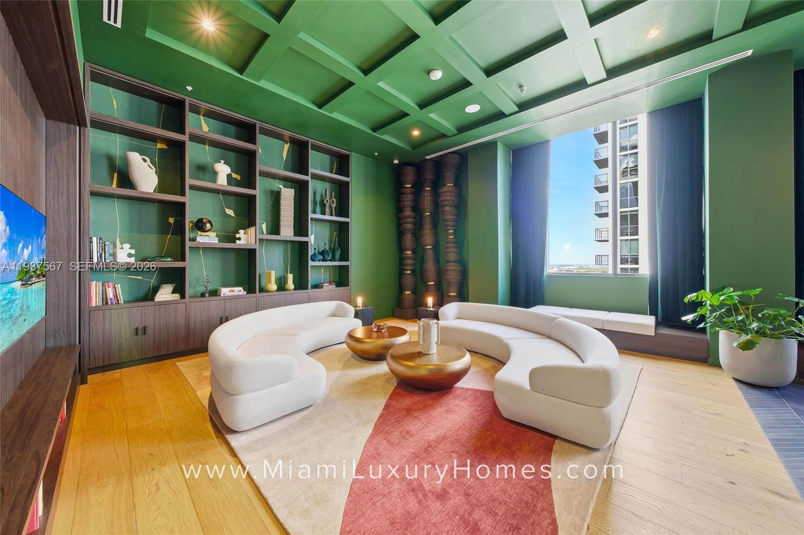 11 Northeast 6th Street, Unit 709 Miami, FL 33132 - Photo 32 of 54 a balcony with furniture and potted plants