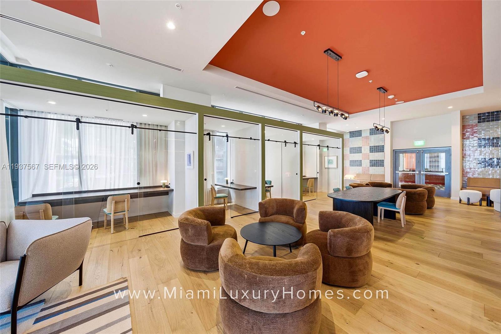11 Northeast 6th Street, Unit 709 Miami, FL 33132 - Photo 37 of 54 a living room with furniture and a large window