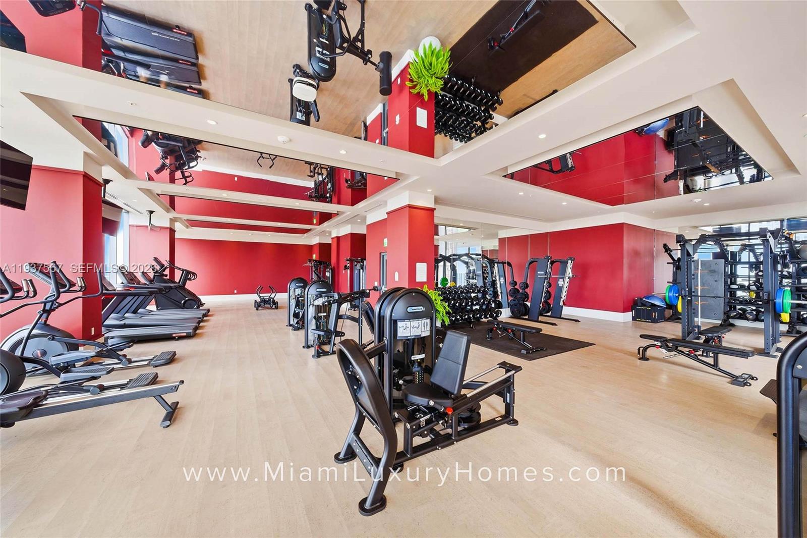 11 Northeast 6th Street, Unit 709 Miami, FL 33132 - Photo 45 of 54 a view of a room with gym equipment