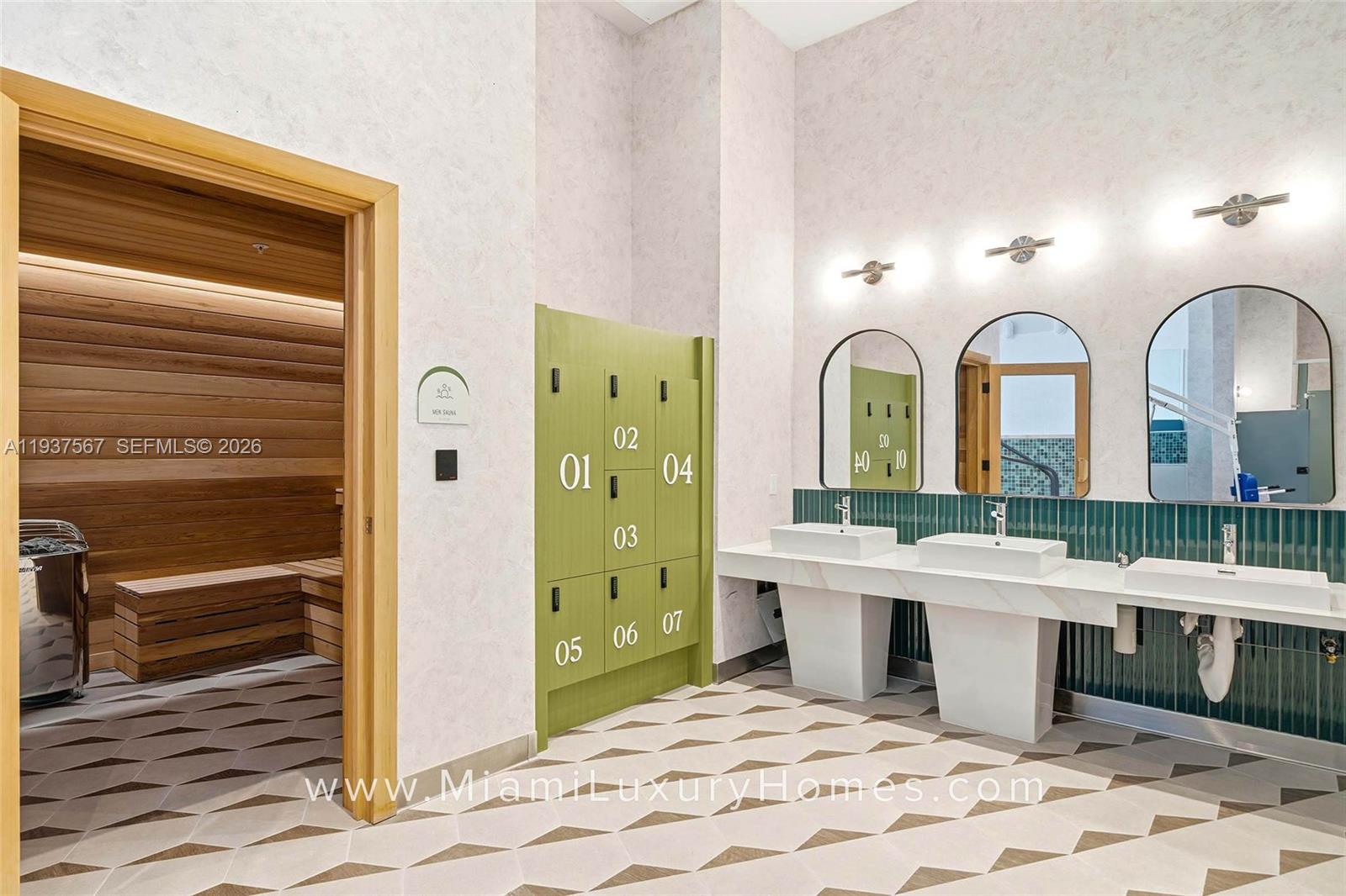 11 Northeast 6th Street, Unit 709 Miami, FL 33132 - Photo 47 of 54 a view of a bathroom with sink mirror and bathtub