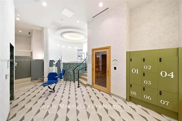 a room with furniture and stairs