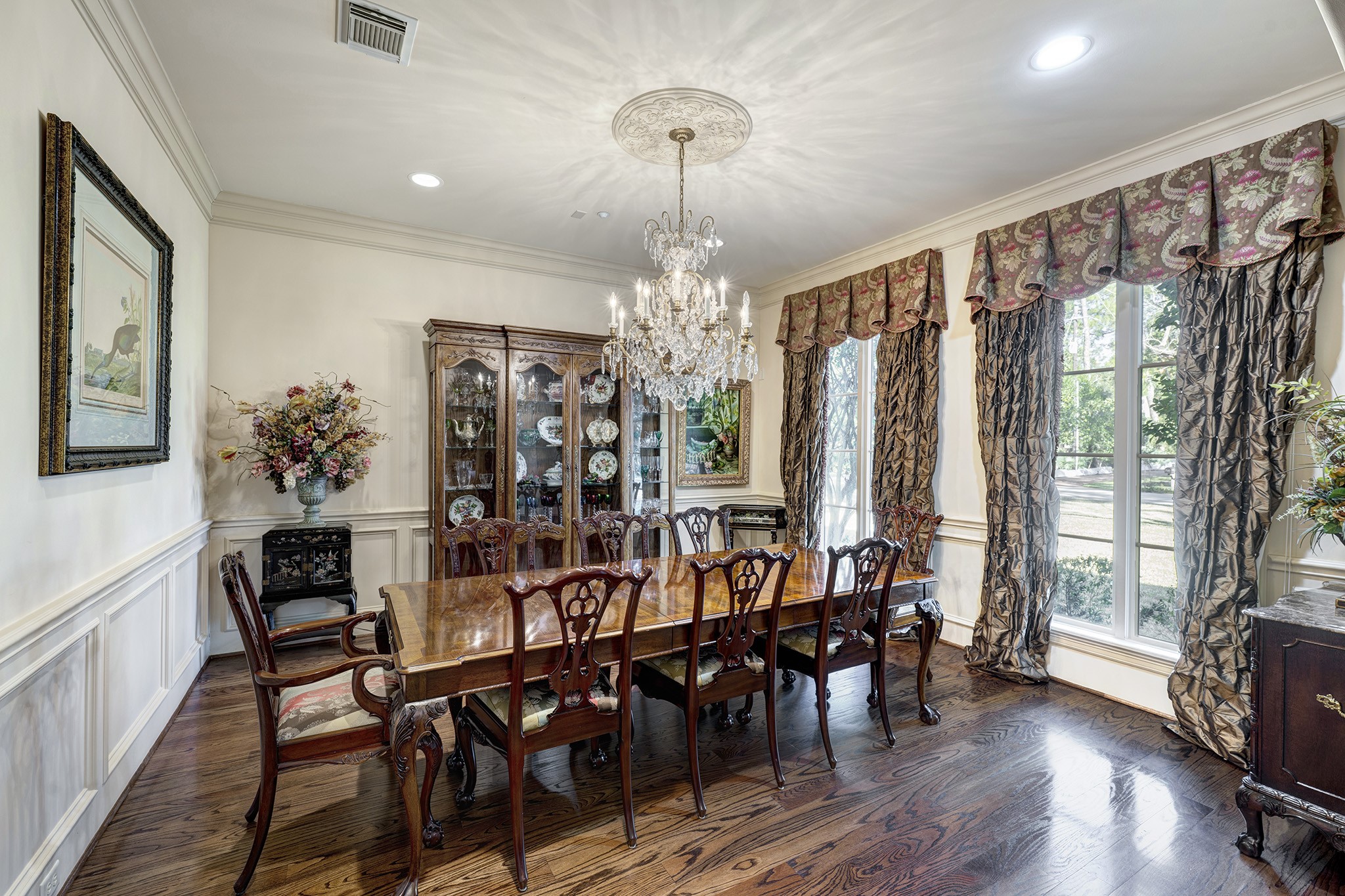 725 Blalock Road Houston, TX 77024 - Photo 3 of 27 a view of a dining room with furniture window and wooden floor