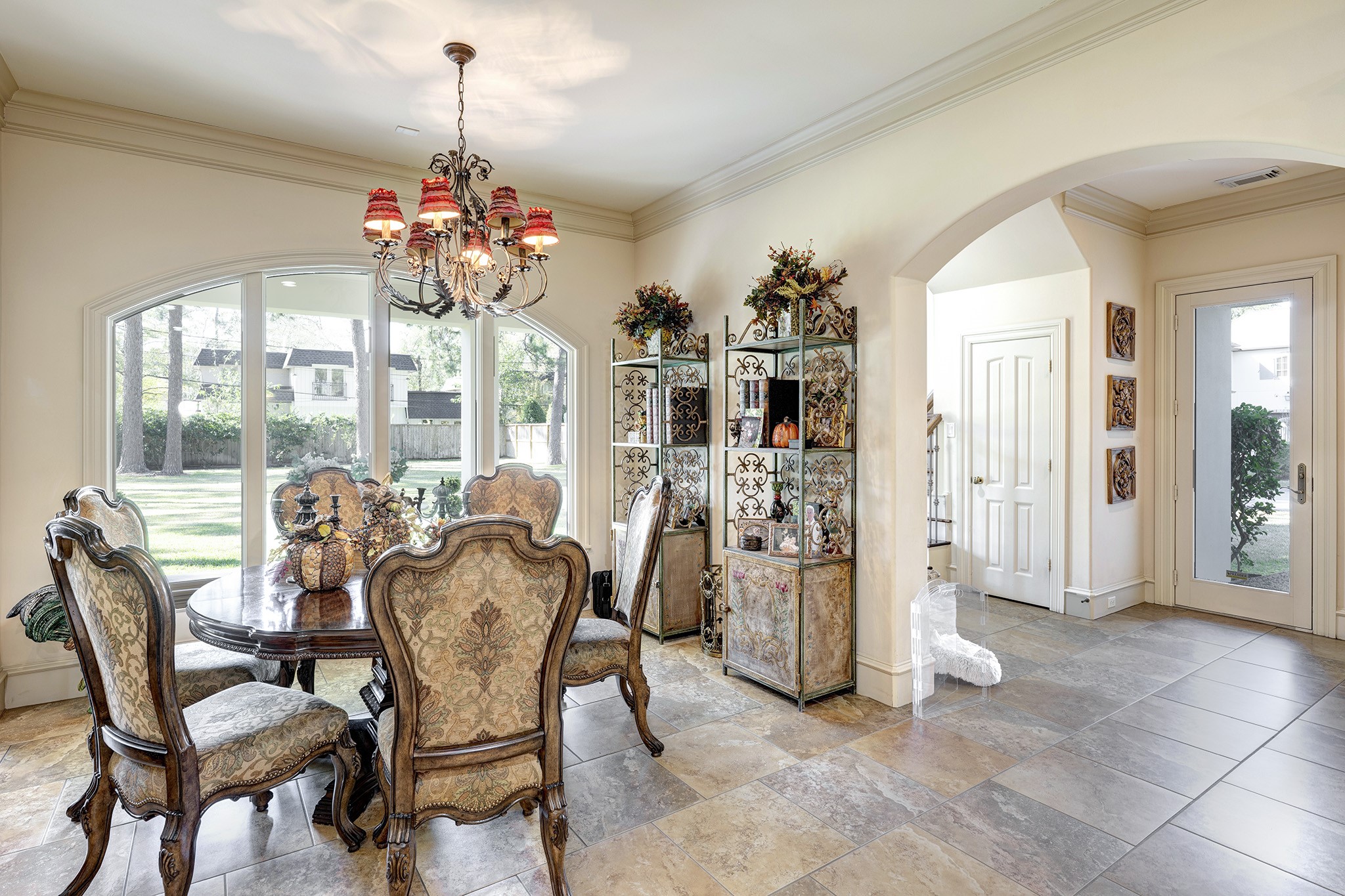 725 Blalock Road Houston, TX 77024 - Photo 8 of 27 a view of a dining room with furniture and window