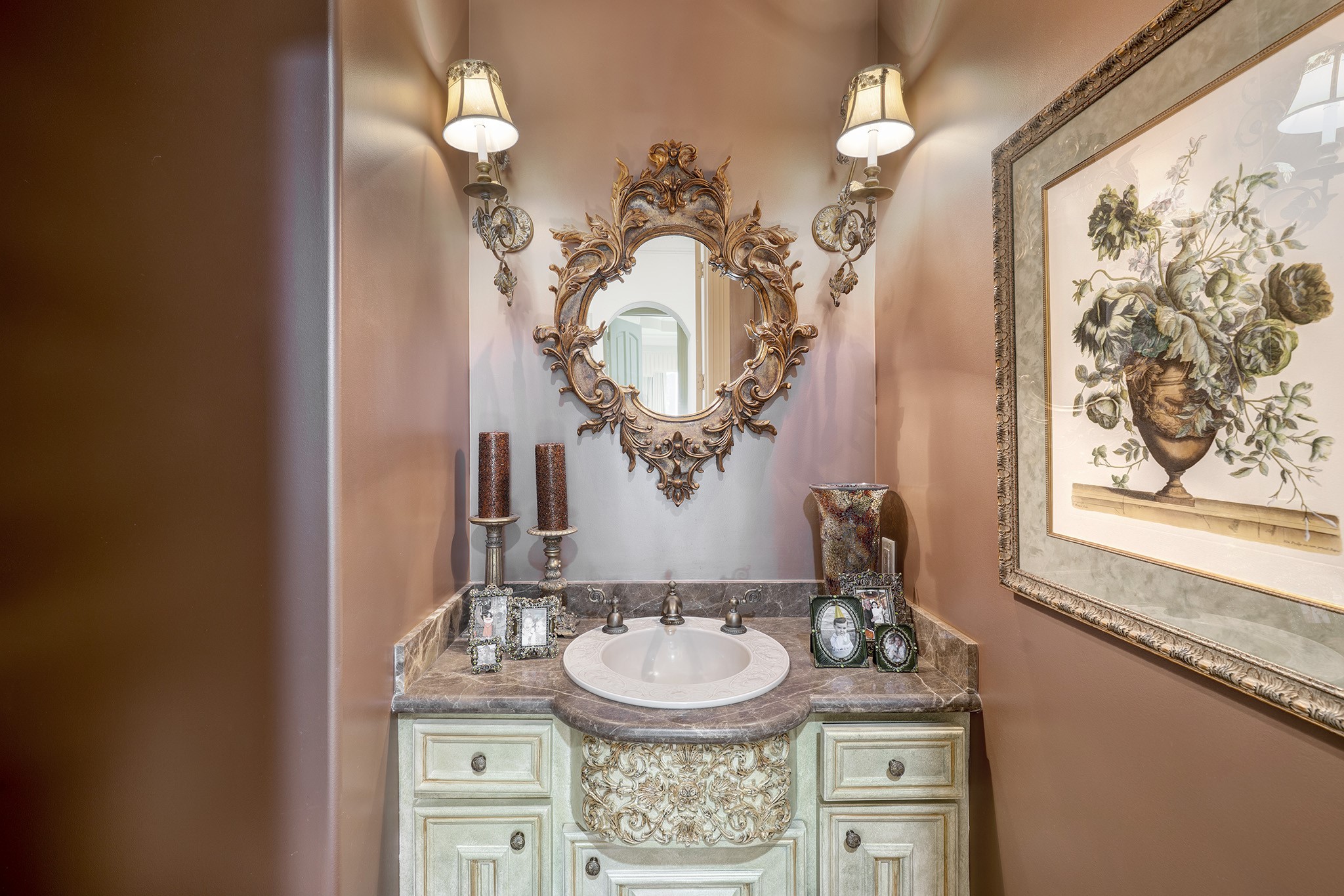 725 Blalock Road Houston, TX 77024 - Photo 9 of 27 a bathroom with a sink and a mirror