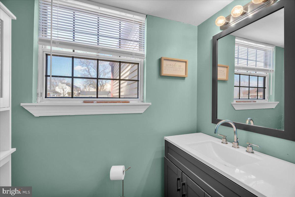 52 Borrelly Boulevard Sewell, NJ 08080 - Photo 11 of 24 a bathroom with a sink and a mirror