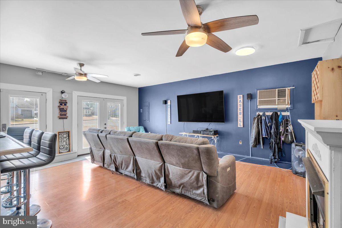 52 Borrelly Boulevard Sewell, NJ 08080 - Photo 12 of 24 a living room with furniture and a flat screen tv