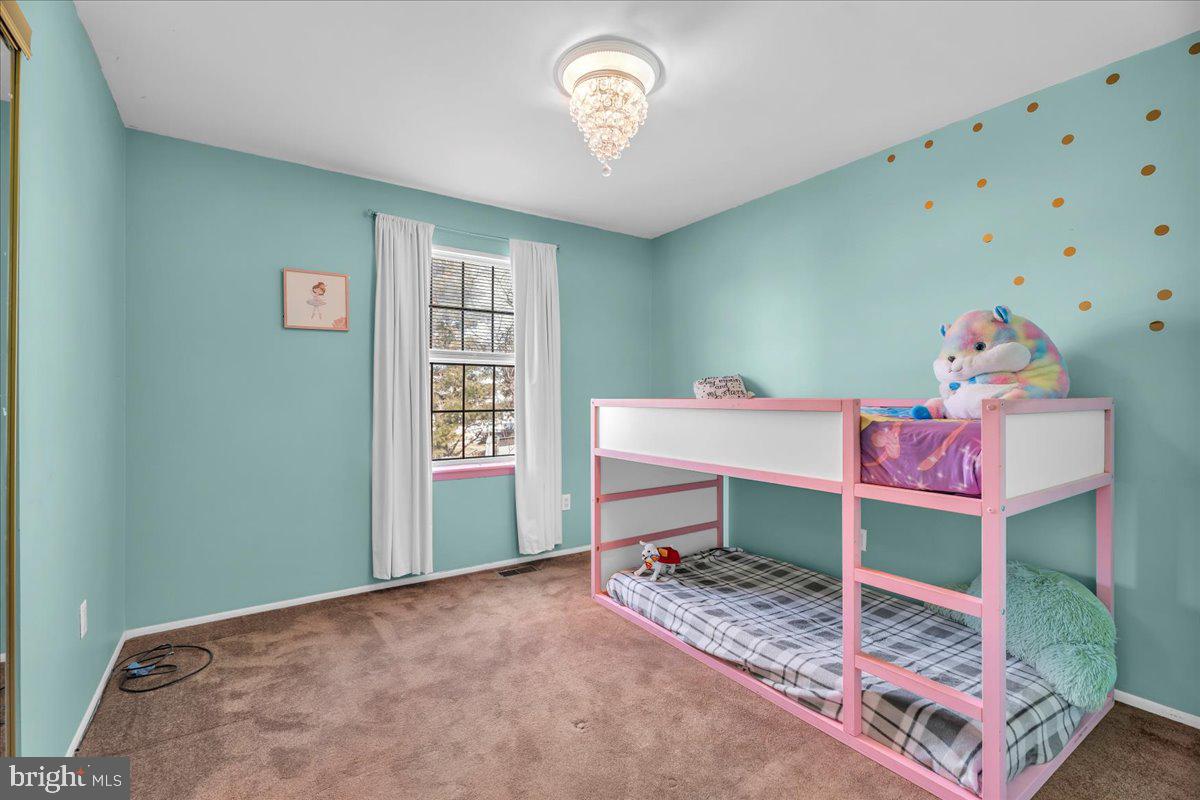 52 Borrelly Boulevard Sewell, NJ 08080 - Photo 19 of 24 a bedroom with a bed and a window