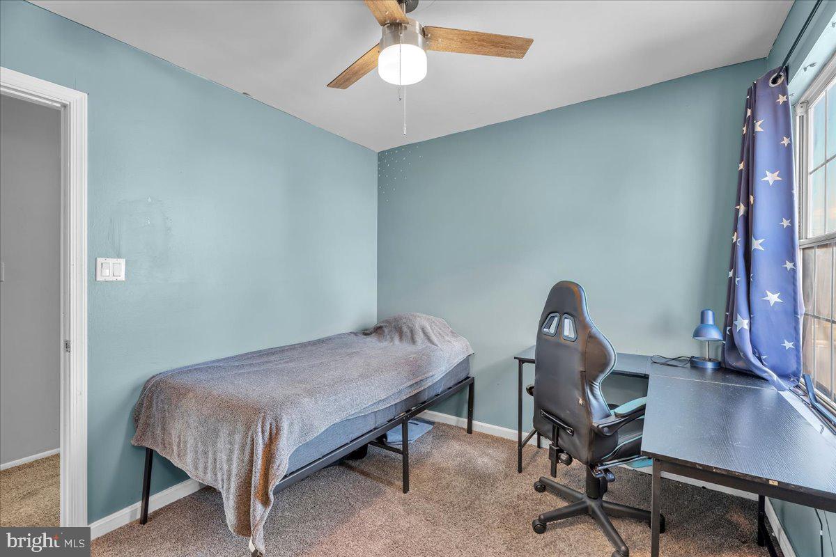 52 Borrelly Boulevard Sewell, NJ 08080 - Photo 20 of 24 a bedroom with a bed and a chandelier